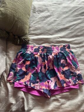 Reebok Women’s Multi-Color Floral Athletic Shorts with Pink Liner